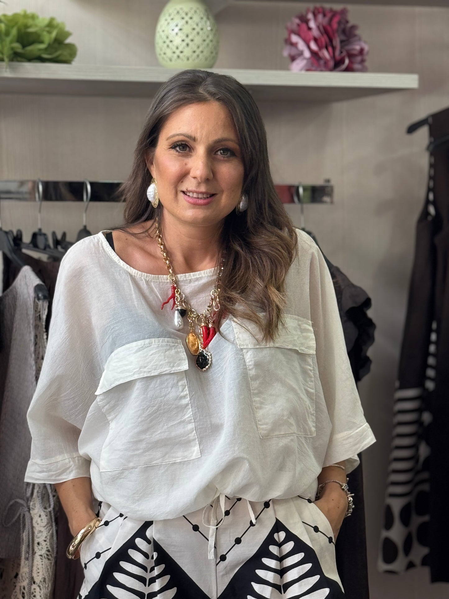 Blusa con tasconi