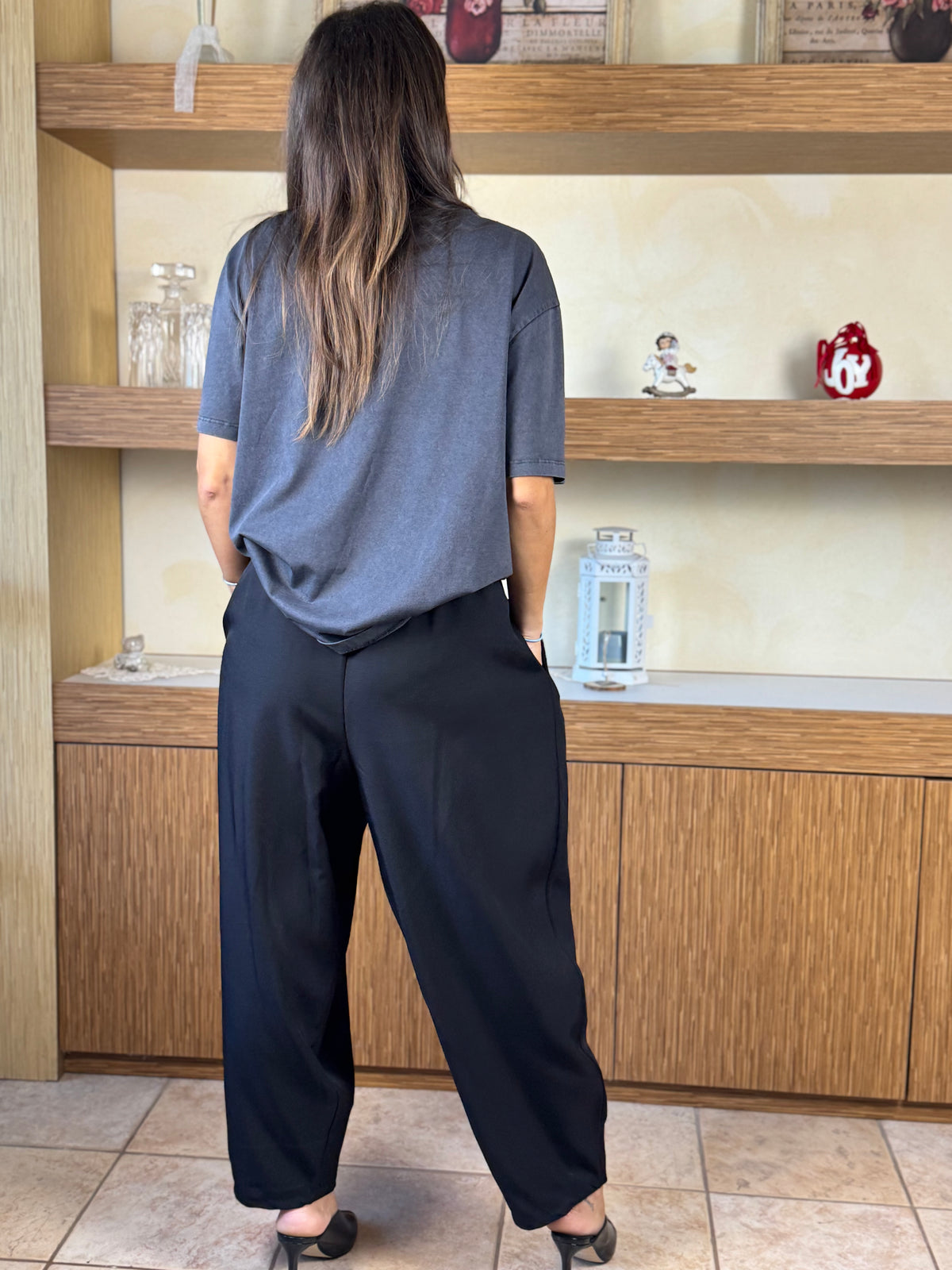 Pantalone con chiusura davanti