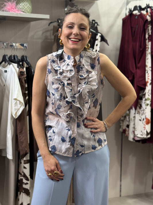 Camicia smanicata fantasia celeste