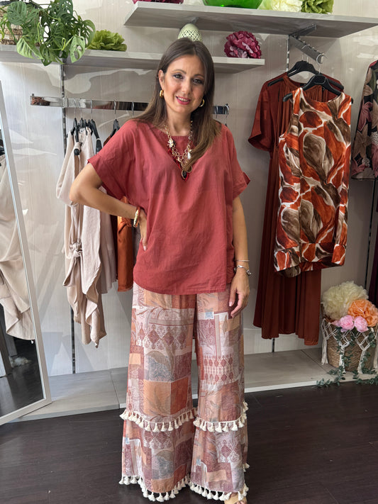 Pantalone con nappine