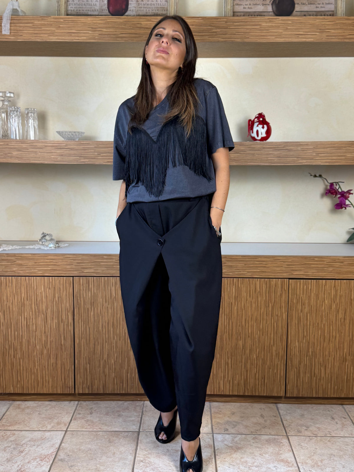 Pantalone con chiusura davanti