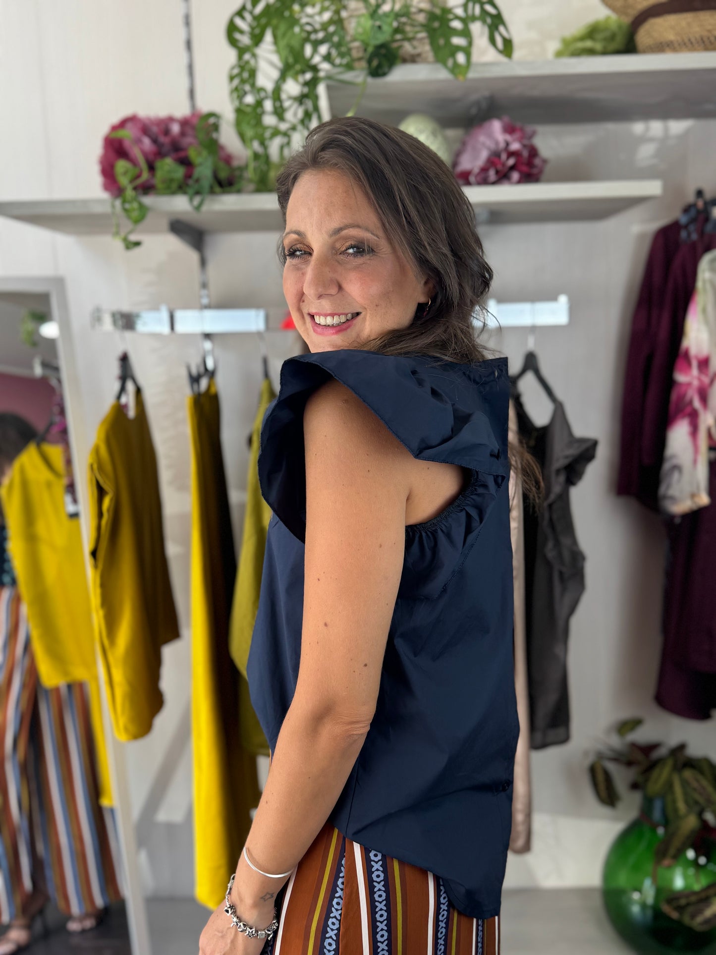 Blusa con abbottonatura dietro
