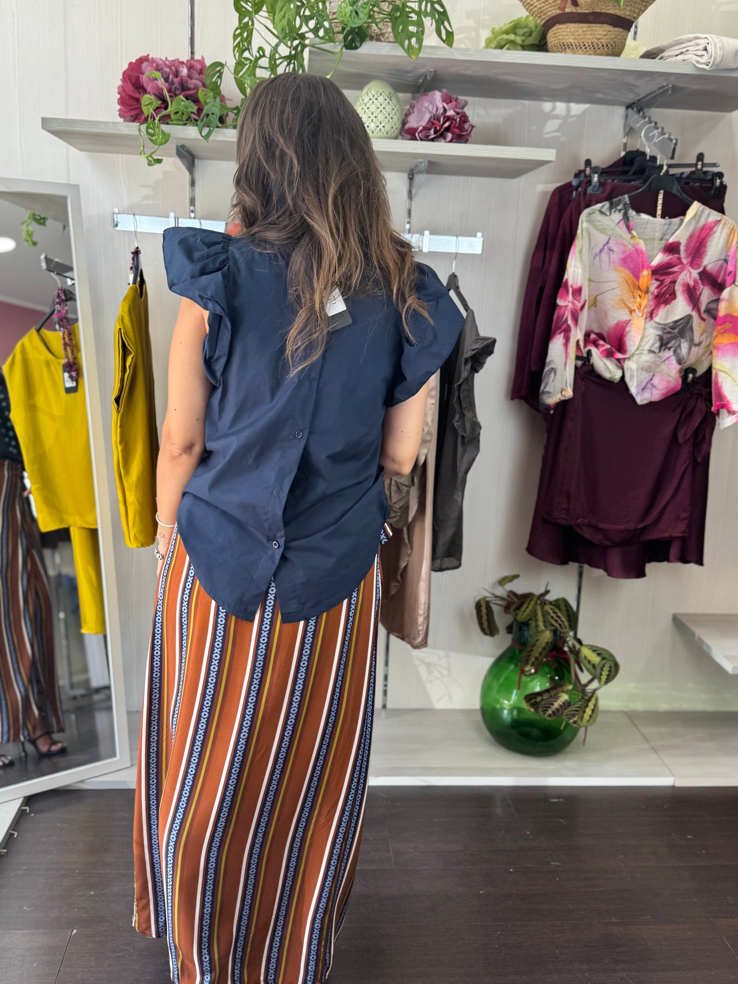 Blusa con abbottonatura dietro